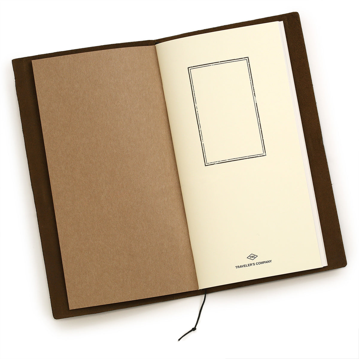 Regular sized notebook open to the first page showing the logo and a blank frame