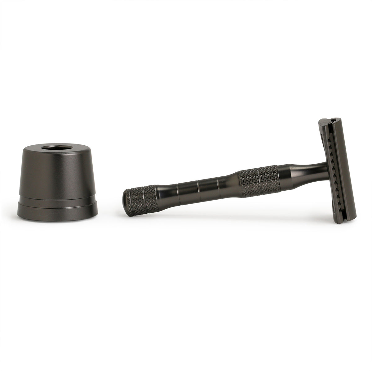 Daily Shaver with charcoal-coloured finish is a three piece razor and comes with a heavy base-style stand