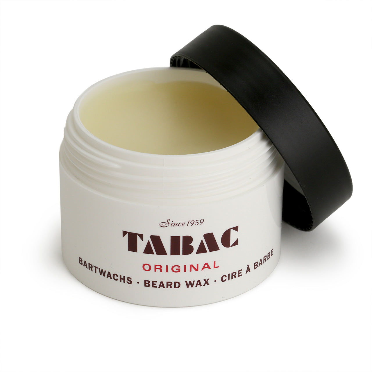 Tabac Original Beard Wax tub sitting on the signature packaging