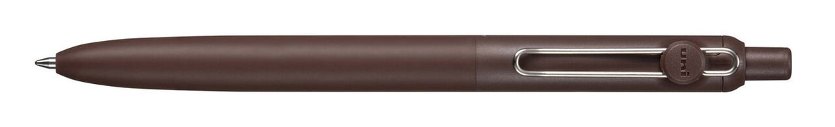 Brown pen with metallic clip on a white background