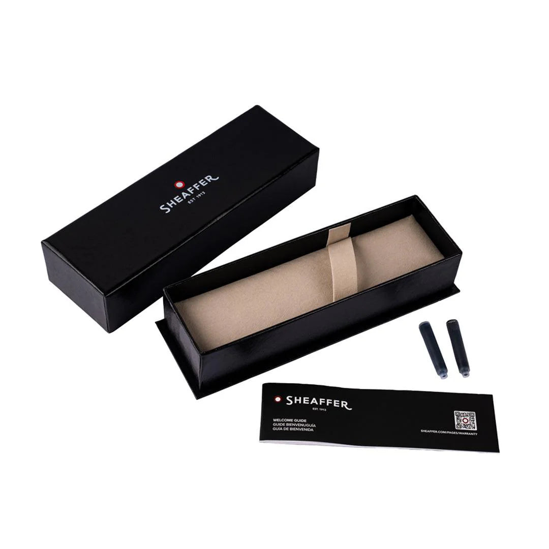 Sheaffer pen set with black box, pen, and accessories on a white background