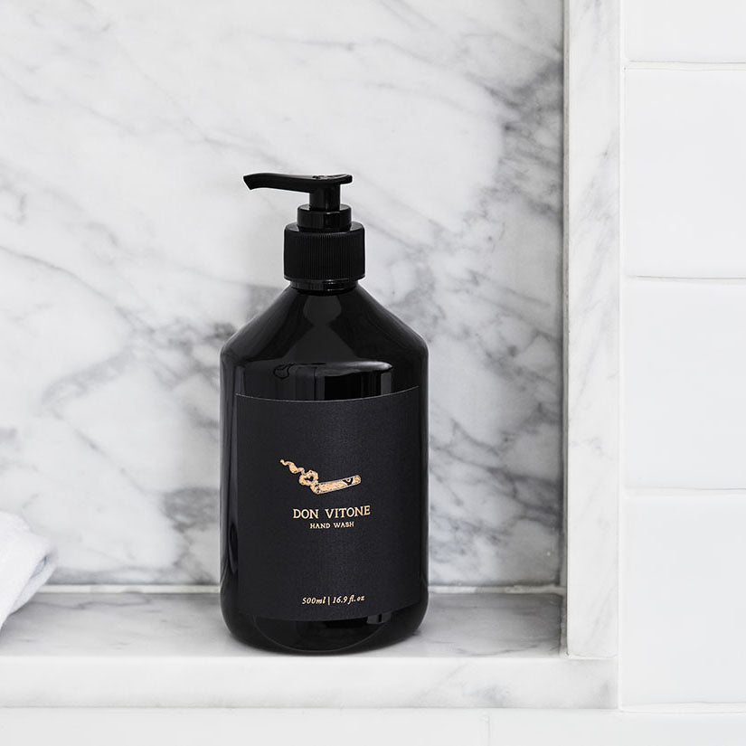 Black bottle of Don Vitone hand wash on a marble surface