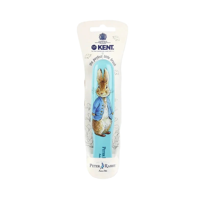 A Kent Peter Rabbit toothpick in its original white cardboard packaging, featuring an illustration of Peter Rabbit on the front.