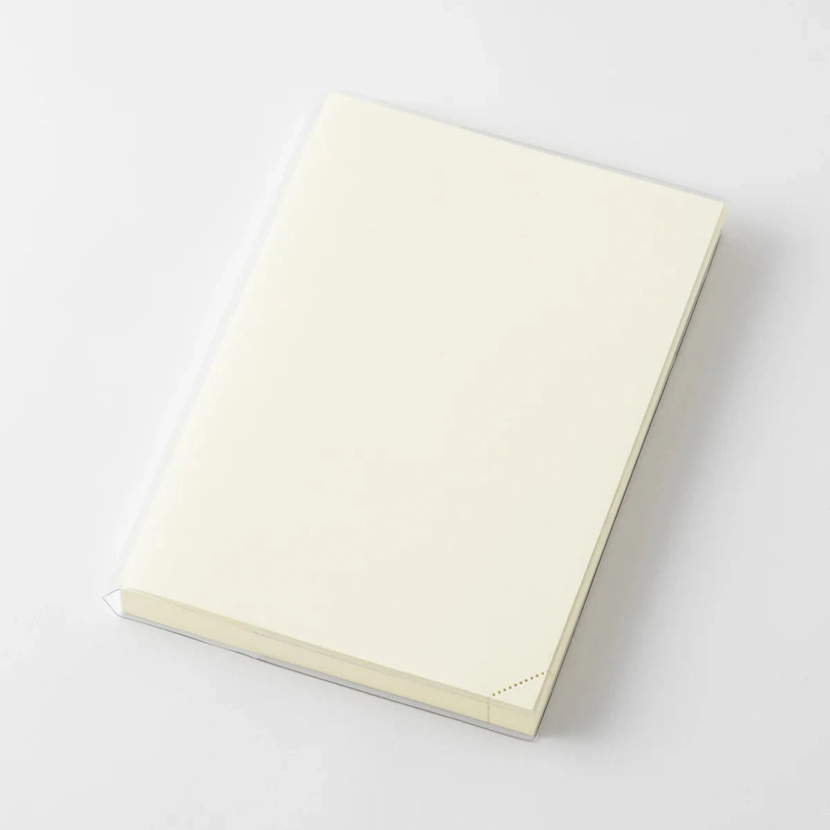 White notebook on a light gray background