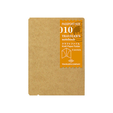 Kraft paper notebook with orange label on a white background