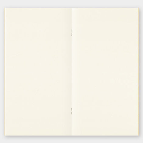 MD paper refill showing the inside spread - stapled with plain cream paper