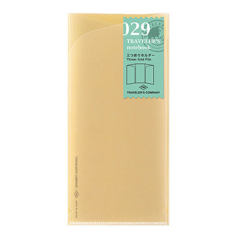Three fold plastic file 029 for Traveler's notebook with a green label on a white background