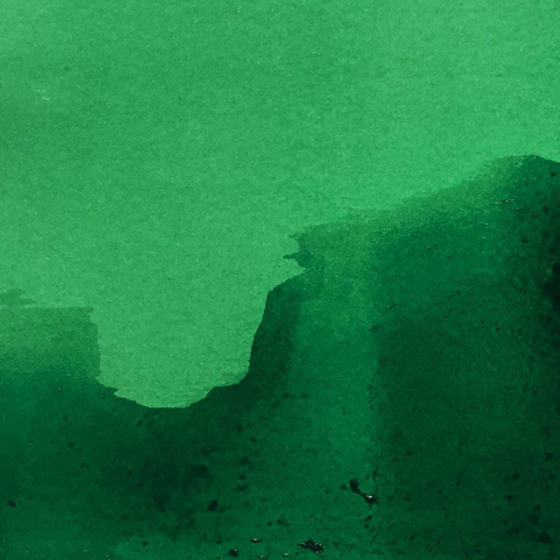 Green textured paper with a subtle pattern
