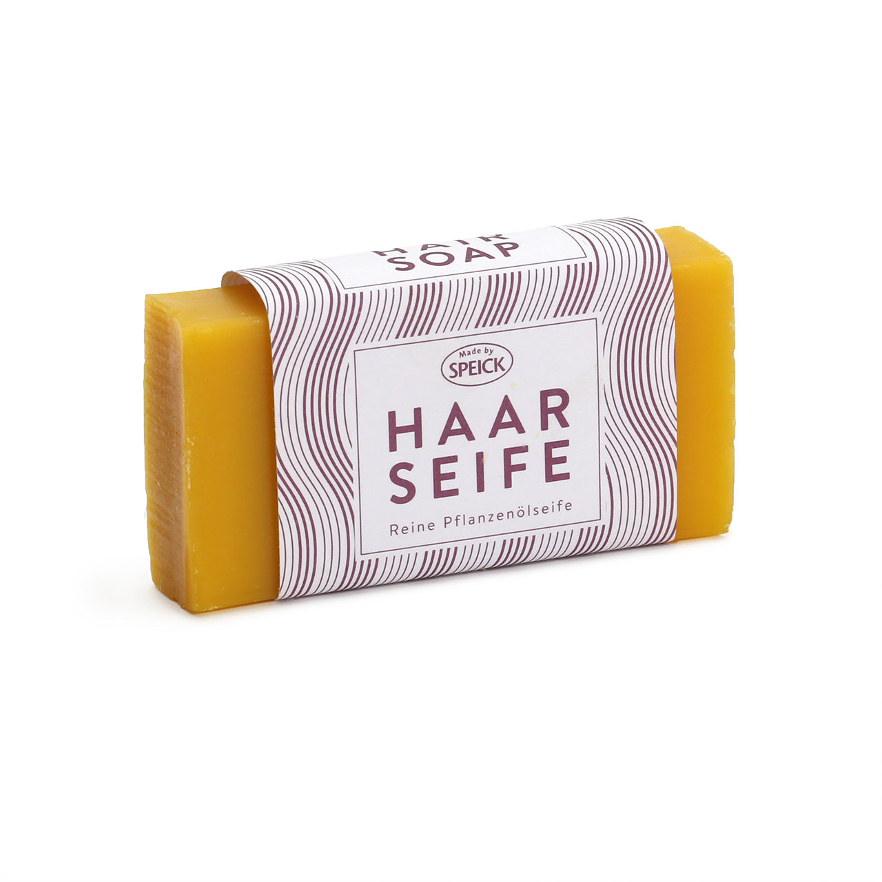 Speick Hair Soap (Haar Seif) is a rich golden colour in a small solid bar with a claret and white coloured paper wrap