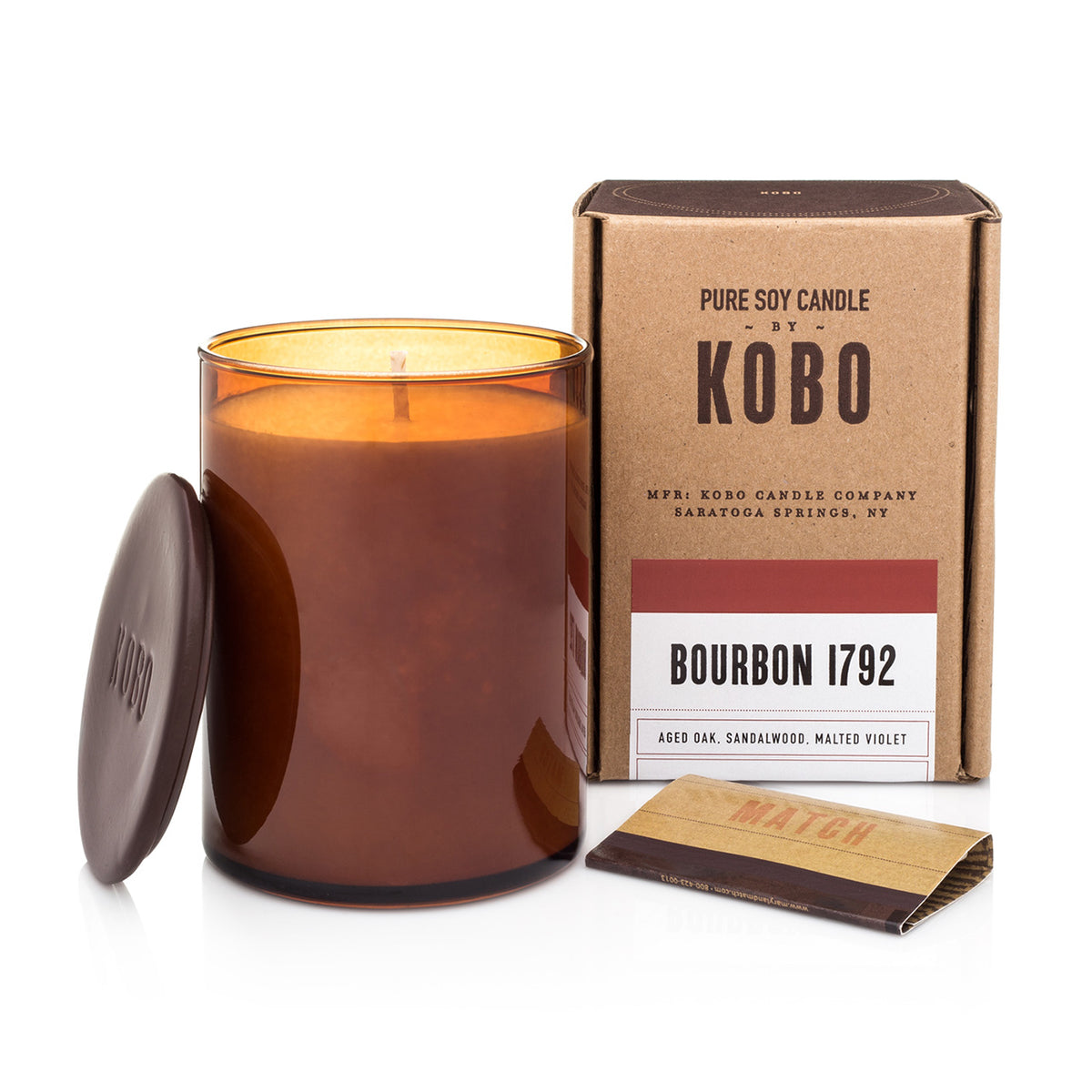 Kobo Large Pure Soy Candle in an amber glass jar with ceramic lid, matches and kraft box. Bourbon 1792 scent