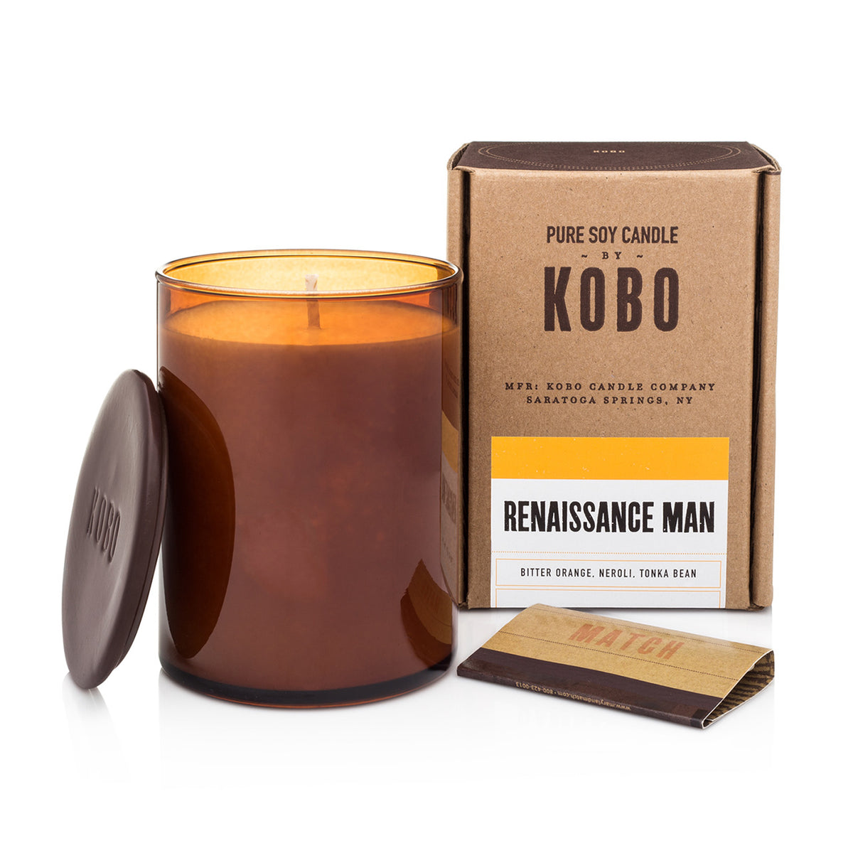 Kobo Large Pure Soy Candle in an amber glass jar with ceramic lid, matches and kraft box. Renaissance Man scent